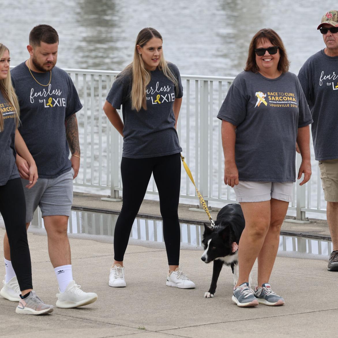 Alexis Carrico walks with her family